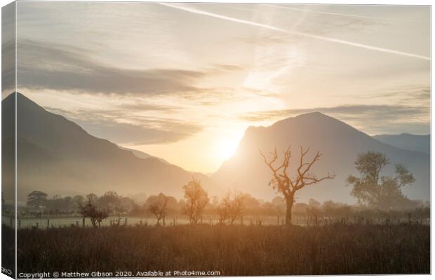 Stunning Winter foggy sunrise over countryside around Crummock Water in Lake District England Canvas Print by Matthew Gibson