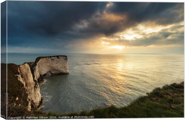 Beautiful cliff formation landscape during stunning sunrise Canvas Print by Matthew Gibson