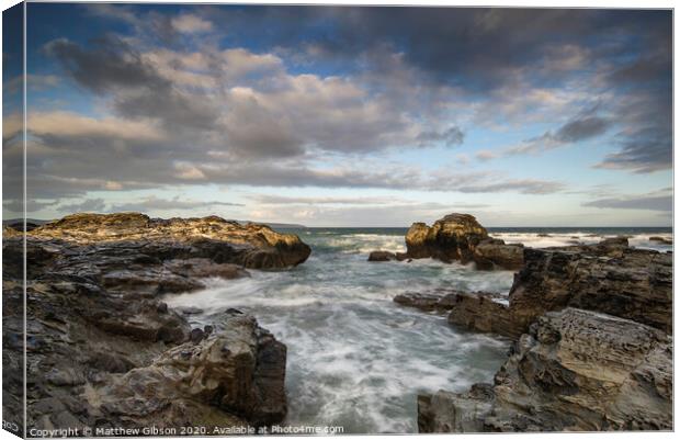 Beautiful sunrise landscape of Godrevy on Cornwall coastline in England Canvas Print by Matthew Gibson