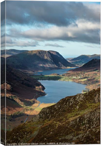 Majestic vibrant Autumn Fall landscape of Buttermere and Crummock Water flanked by mountain peaks of Haystacks High Stile and Mellbreak in Lake District Canvas Print by Matthew Gibson