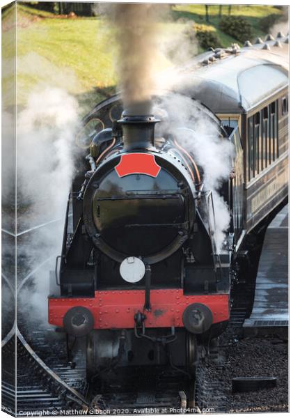 Beautiful old vintage steam railway engine with full steam blowing Canvas Print by Matthew Gibson