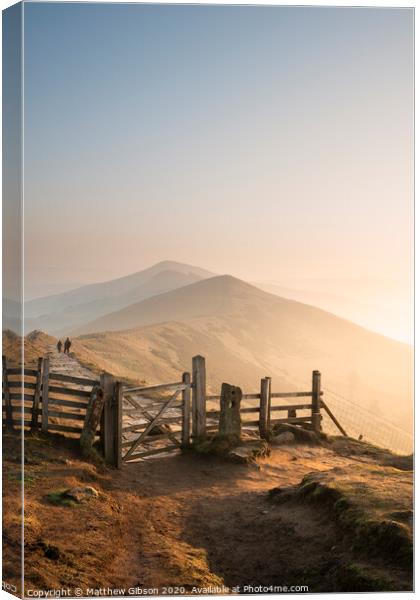 Stunning Winter sunrise landscape image of The Great Ridge in the Peak District in England with a cloud inversion and mist in the Hope Valley with a lovely orange glow Canvas Print by Matthew Gibson