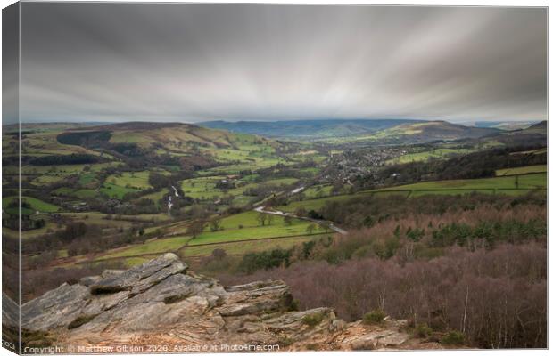 Dramatic moody Winter landscape image of Peak District in England during soft afternoon light Canvas Print by Matthew Gibson