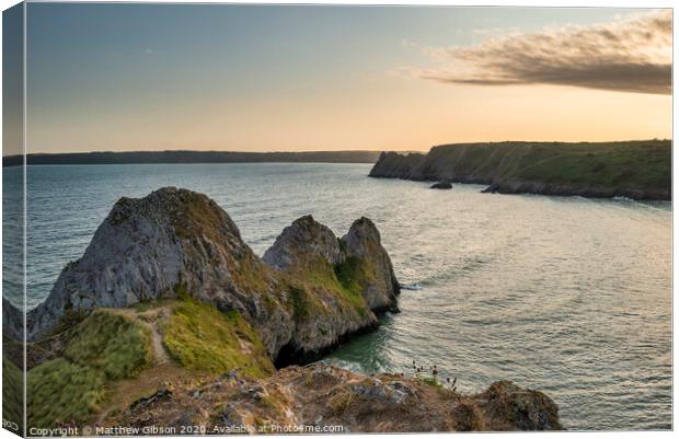 Beautiful peaceful Summer evening sunset beach landscape image at Three Cliffs Bay in South Wales  Canvas Print by Matthew Gibson