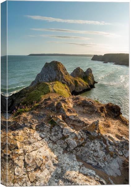 Beautiful peaceful Summer evening sunset beach landscape image at Three Cliffs Bay in South Wales  Canvas Print by Matthew Gibson