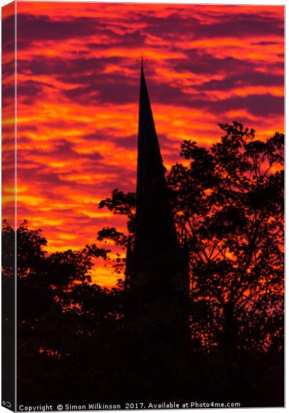 Fire in the Sky Canvas Print by Simon Wilkinson