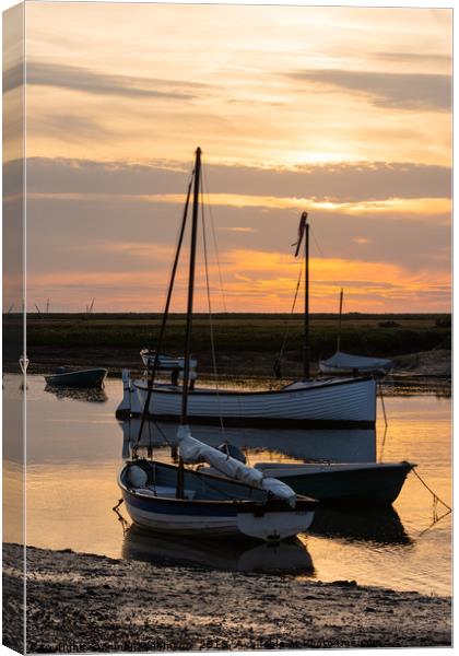 Sunset at Burnham Overy Staithe Canvas Print by Simon Wilkinson