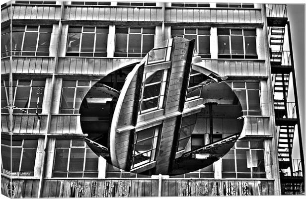 Rotating Building Canvas Print by Neil Gavin