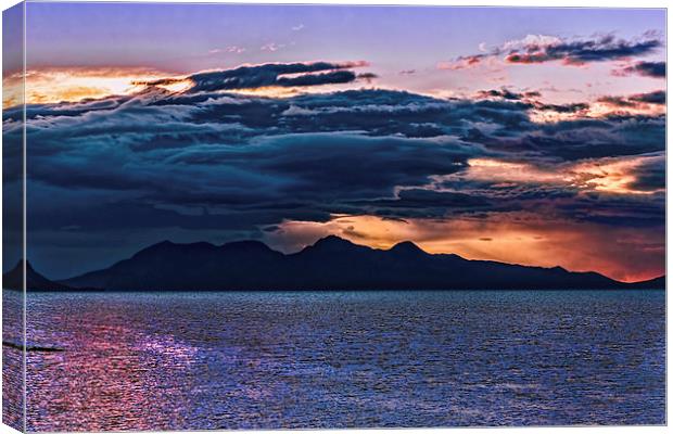 Sunset storm over the Isle of Rum Canvas Print by Hugh McKean