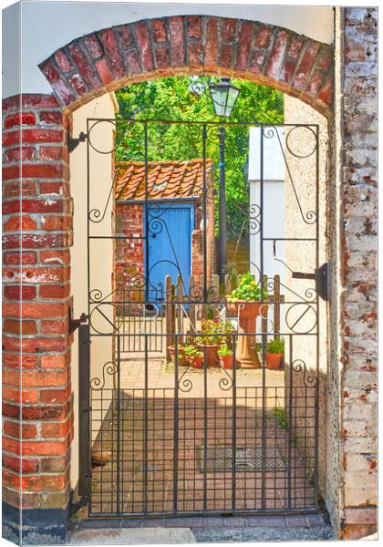 Through the gate into the sunshine Canvas Print by Hugh McKean