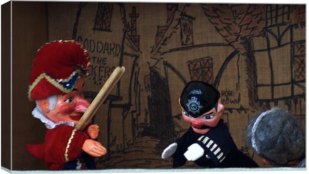 Punch and Judy with the policeman Canvas Print by Chris Day