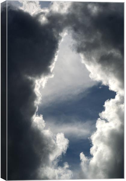 Clouds Through the Keyhole Canvas Print by Chris Day