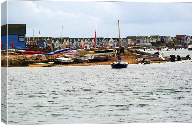 Beach Huts and boats at Hengistbury Head Dorset Canvas Print by Chris Day