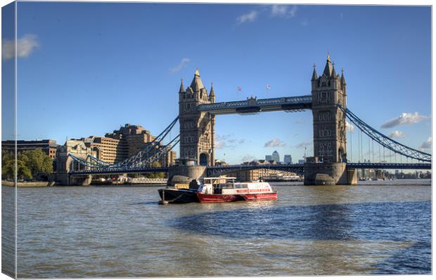 Tower Bridge with Canary Wharf in the Background Canvas Print by Chris Day