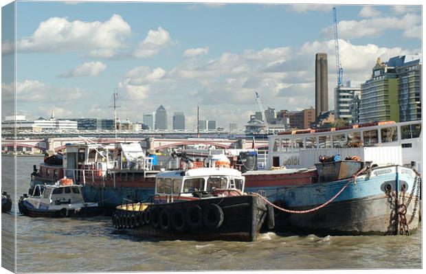 Thames barges and Canary Wharf Canvas Print by Chris Day