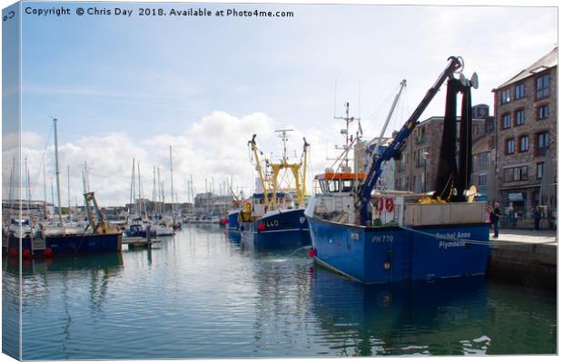 Fishing boats in Sutton Harbour Canvas Print by Chris Day