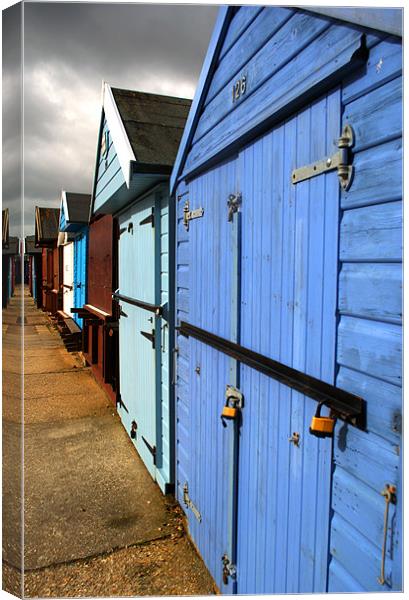Highcliffe huts Canvas Print by Chris Day