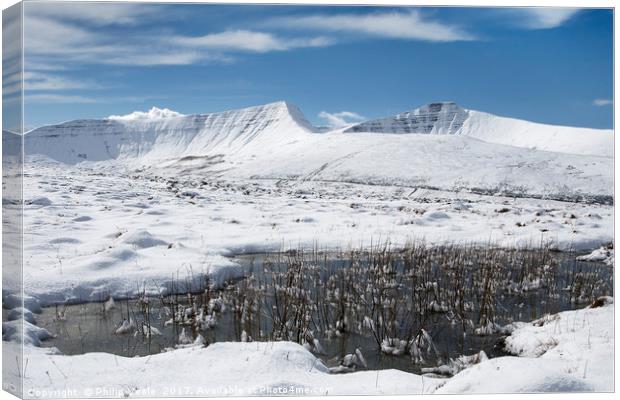 Pen y Fan and Cribyn's Snow Covered Peaks. Canvas Print by Philip Veale