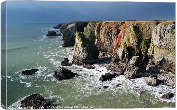 Stack Rocks Pembrokeshire as a storm approaches. Canvas Print by Philip Veale