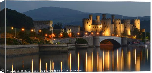 Conwy Castle's Dusk Illumination Canvas Print by Philip Veale