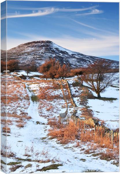 Sugar Loaf Abergavenny in Winter's Embrace. Canvas Print by Philip Veale