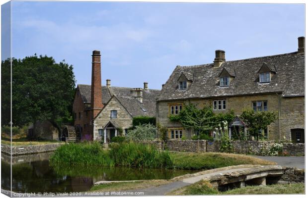 The Old Mill, Lower Slaughter in Summer. Canvas Print by Philip Veale