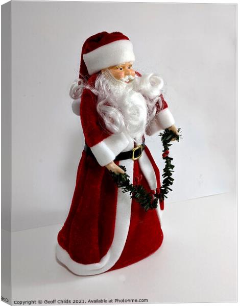  Christmas theme image with Santa.  Canvas Print by Geoff Childs