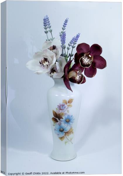  White and purple Cymbidium Orchids (Boat Orchids) Canvas Print by Geoff Childs
