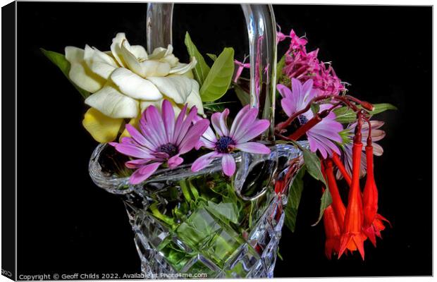  Cut Glass Vase full of mixed colourful fresh flowers.  Canvas Print by Geoff Childs