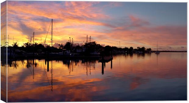 Sunrise silhouette Tin Can Bay. Canvas Print by Geoff Childs