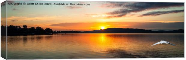 Orange sunrise waterscape reflections panorama. Canvas Print by Geoff Childs