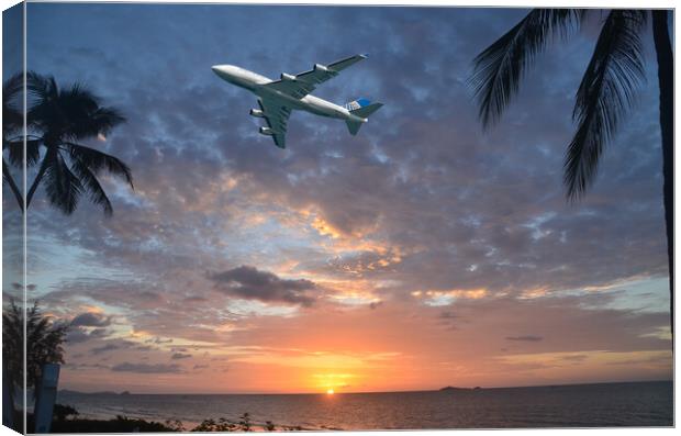 Aircraft flying in tropical dawn sky. Thailand. Canvas Print by Geoff Childs