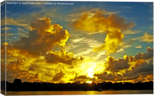 Golden coloured coastal sunrise cloudscape. Canvas Print by Geoff Childs