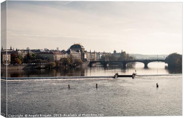 Prague view of the Vlatva river  Canvas Print by Angela Bragato