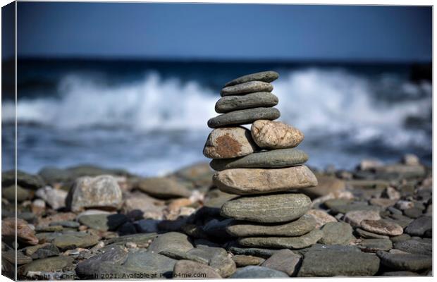 A  cairn pebble tower. Canvas Print by Chris North