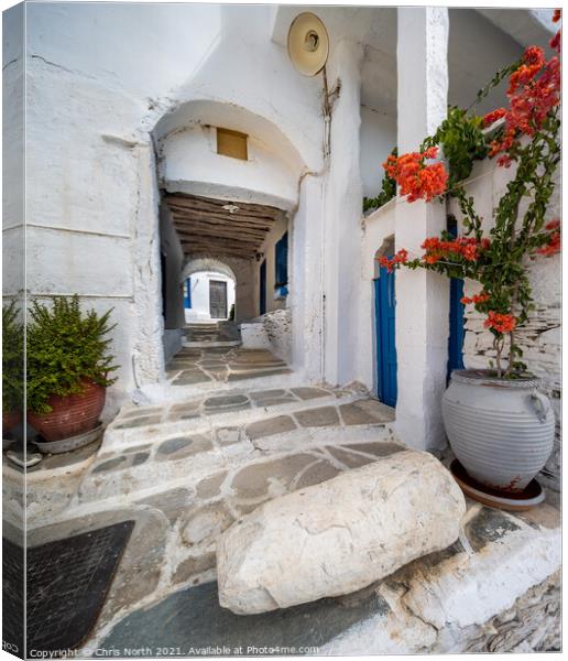 Backstreet scene of the hillside village of kastro on Sifnos Island. Canvas Print by Chris North