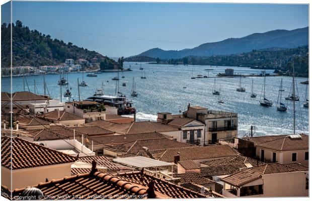 Poros rooftops. Canvas Print by Chris North