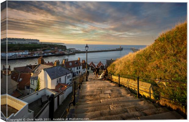 Whitby Harbour sunset scene from the 199 steps. Canvas Print by Chris North