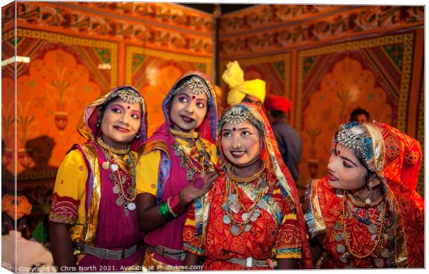 Dances in traditional costume at the Camel fair Jaisalmer. Canvas Print by Chris North