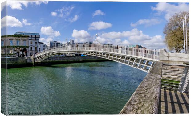 Half penny bridge over the river Liffey, Dublin. Canvas Print by Chris North