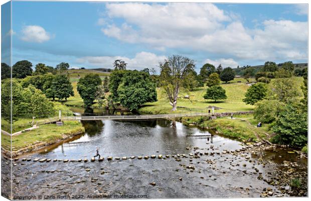 Steppingstones over the river Wharf. Canvas Print by Chris North