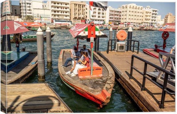 Water taxi on Dubai creek. Canvas Print by Chris North