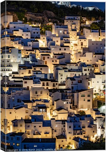 Casares townhouses at night, Andalusia Spain. Canvas Print by Chris North