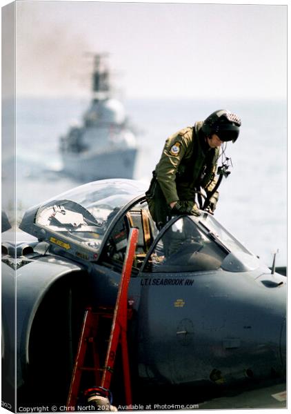 Pilot climbing onboard a Sea Harrier. Canvas Print by Chris North