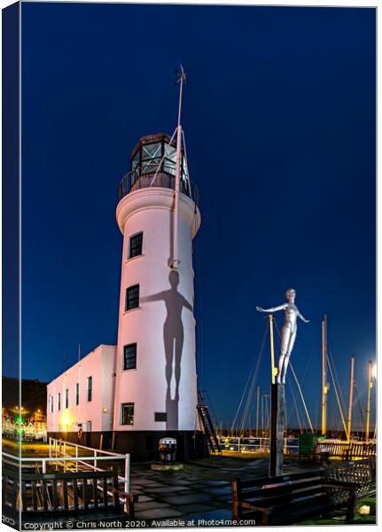 Scarborough Lighthouse at dusk. Canvas Print by Chris North