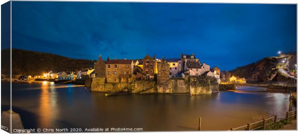 Staithes harbour at flood tide. Canvas Print by Chris North