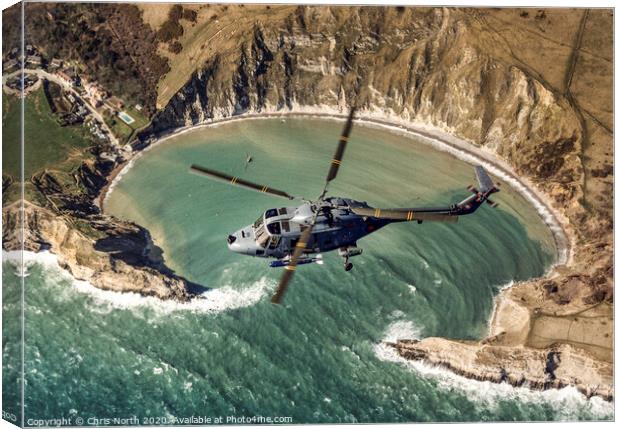 Royal Navy Lynx over Lulworth Cove Canvas Print by Chris North