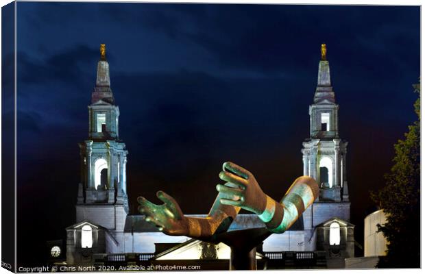 Helping Hands sculpture in Leeds. Canvas Print by Chris North