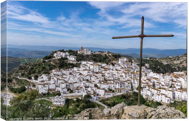 The white mountain village of Casares. Canvas Print by Chris North