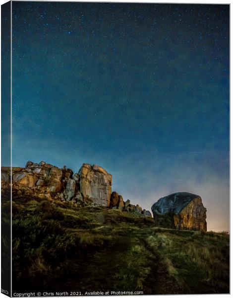 Cow and calf rocks by starlight. Canvas Print by Chris North